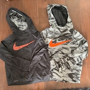 Nike Hoodies with Swoosh Logo in Black, Gray, and Orange.